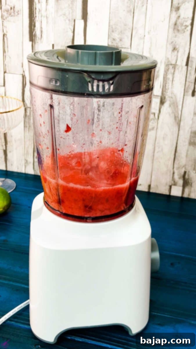 Start the blender and keep blending until you achieve a nice frozen mixture that looks something like a slushy.