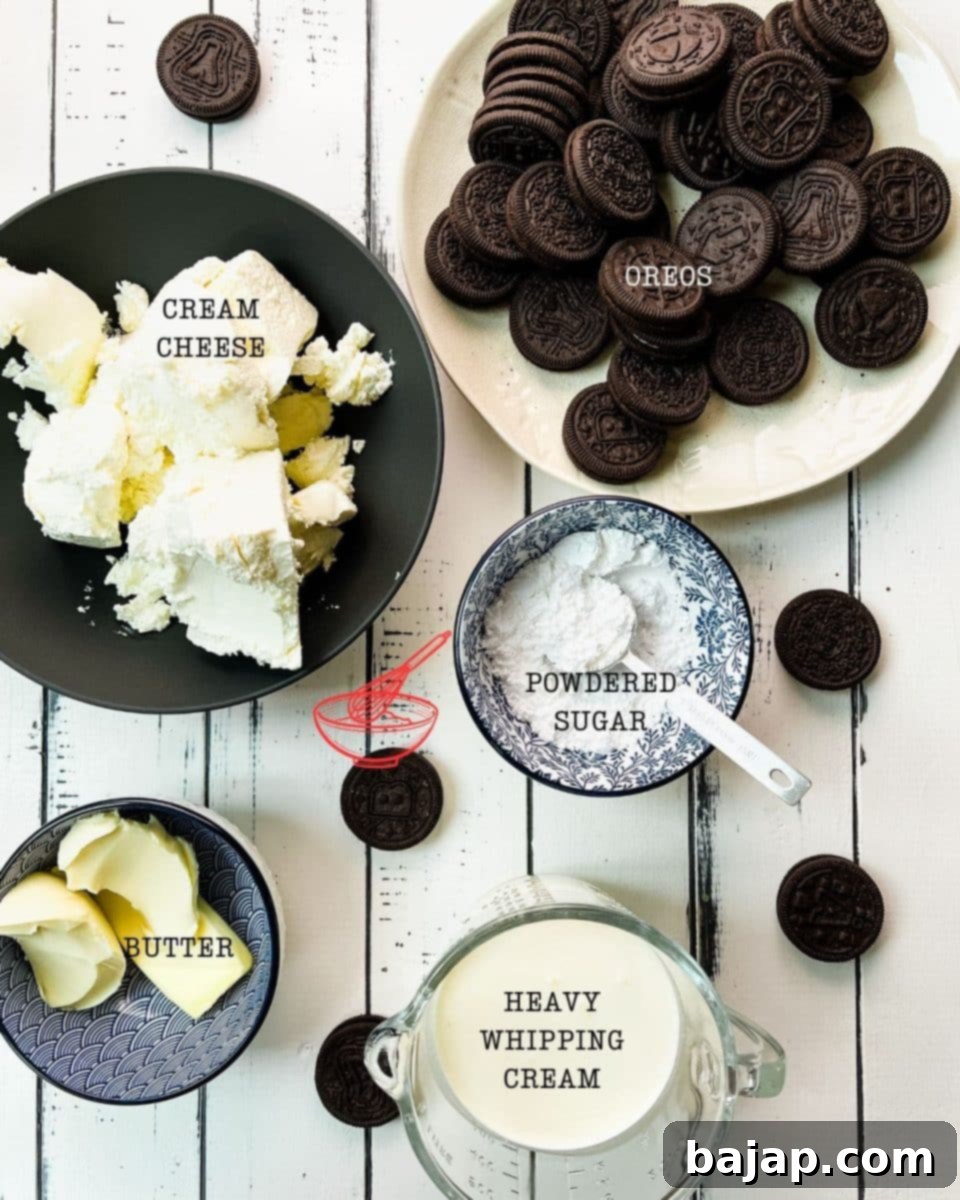 Ingredients for no-bake mini Oreo cheesecakes including Oreo cookies, butter, cream cheese, powdered sugar, and heavy whipping cream.