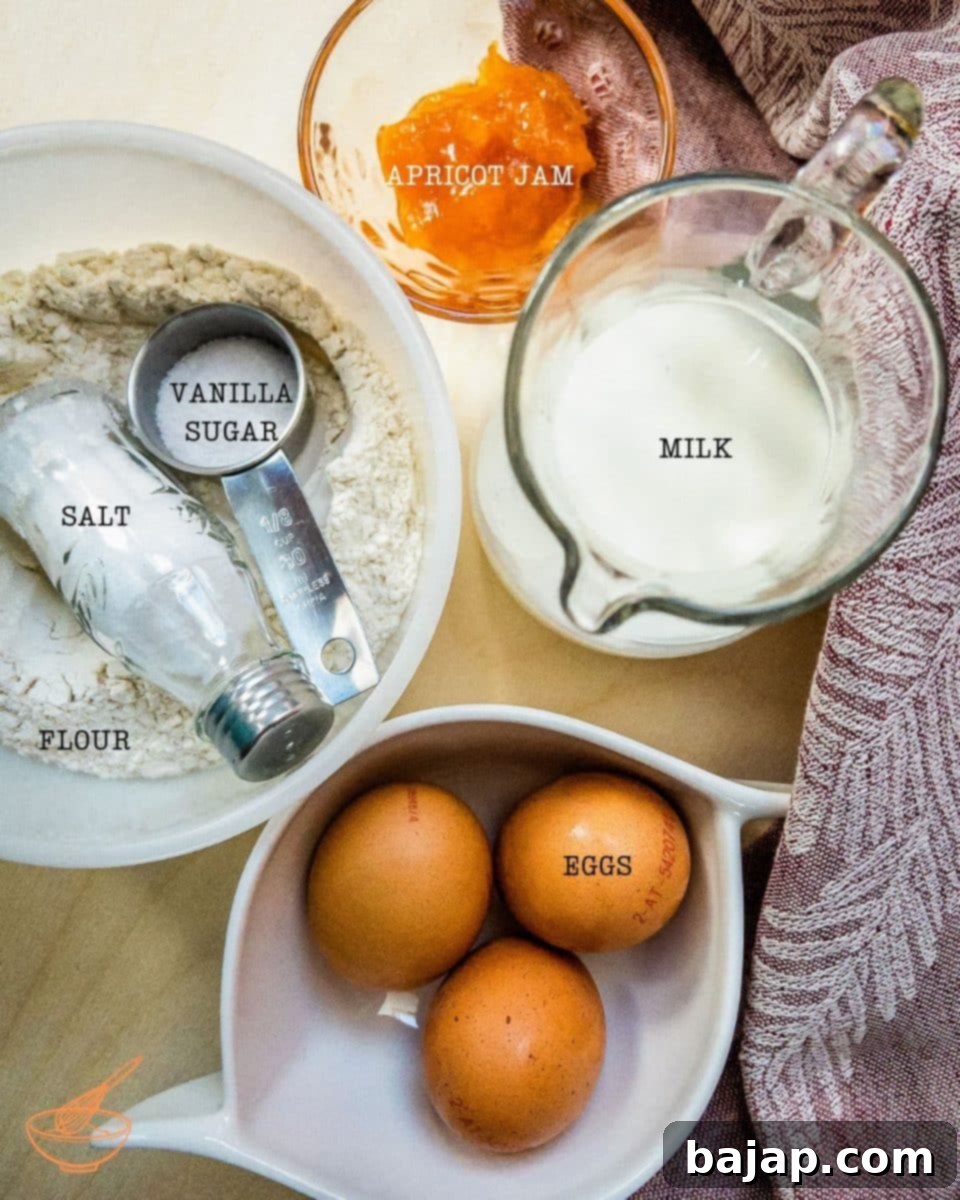 Ingredients for delicious thin pancakes with apricot jam.