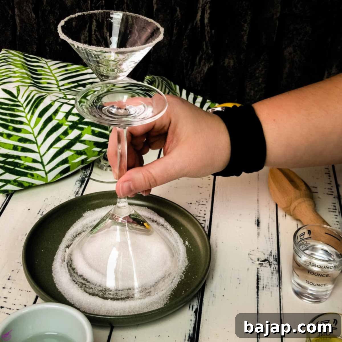 Turn the rim of your cocktail glass through the fine sugar to create a beautiful sugar rim.