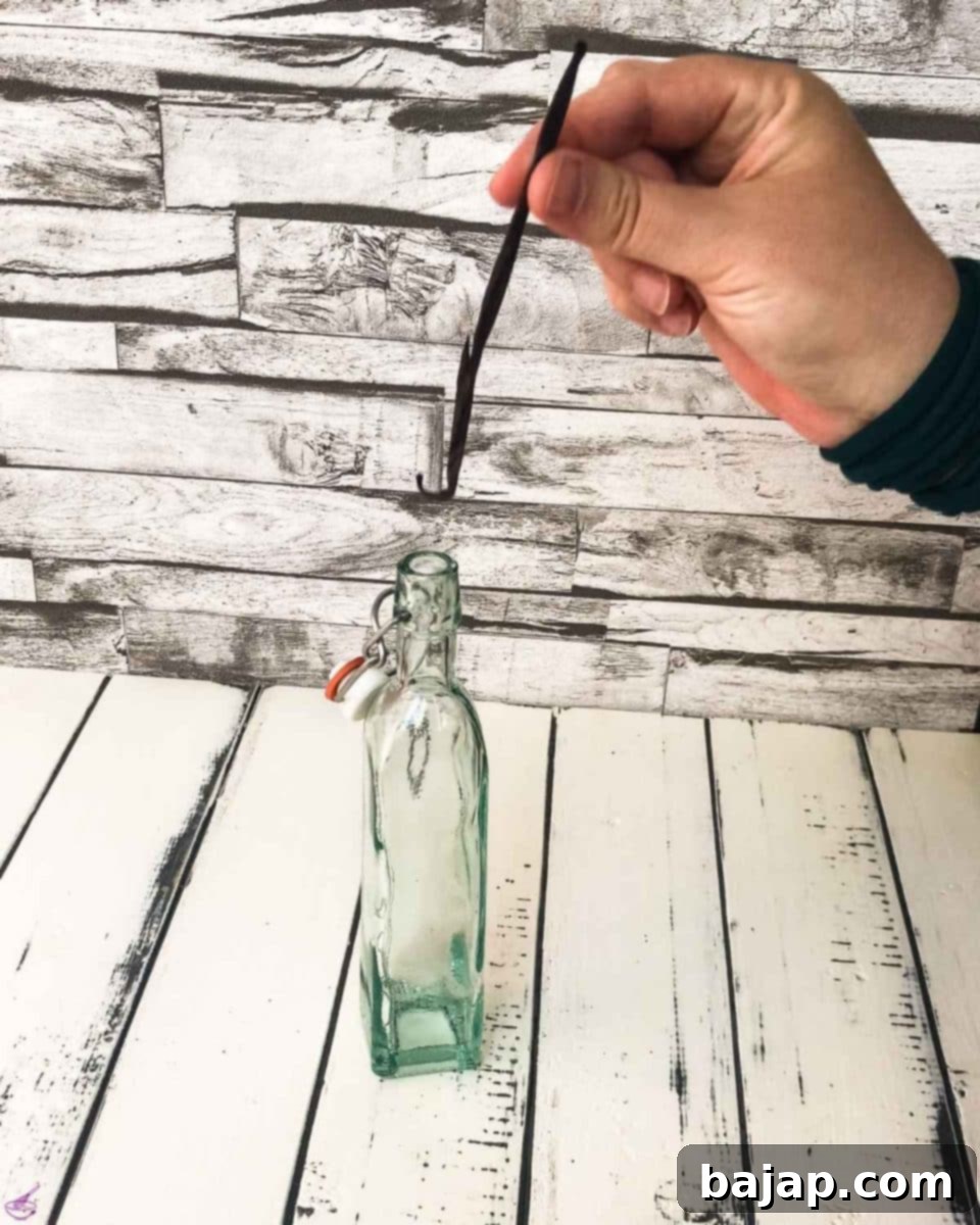Add the vanilla bean to the bottle.