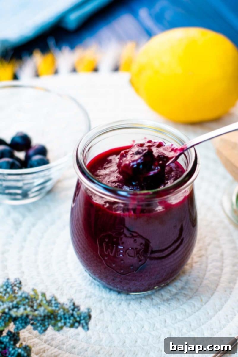 Gorgeous preserving jar filled with a delicious blueberry sauce. This makes the perfect blueberry topping for cheesecakes!