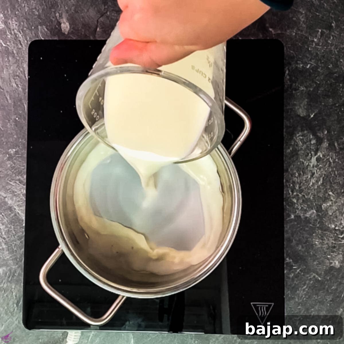 Add the milk to the saucepan.