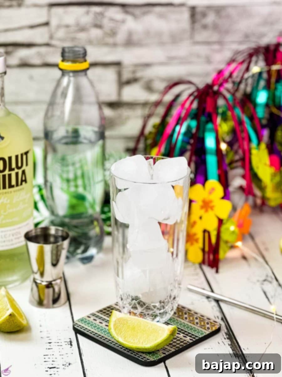 Fill the entire glass with cubed ice.