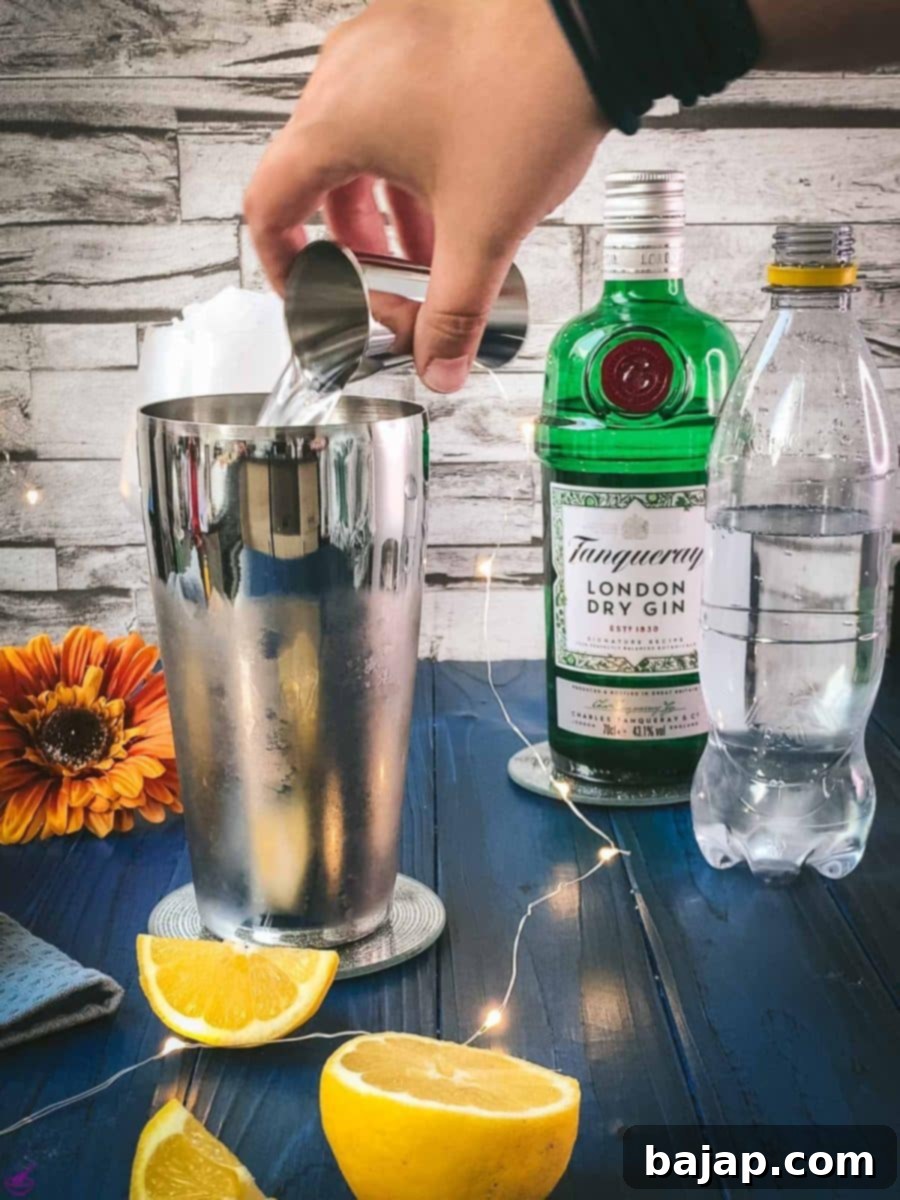 Add gin to your shaker.