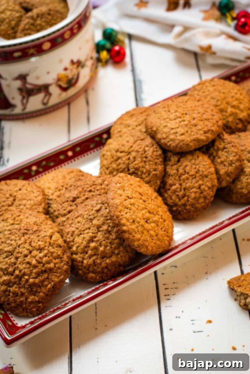 Oatmeal cinnamon cookies placed on Christmas plate.