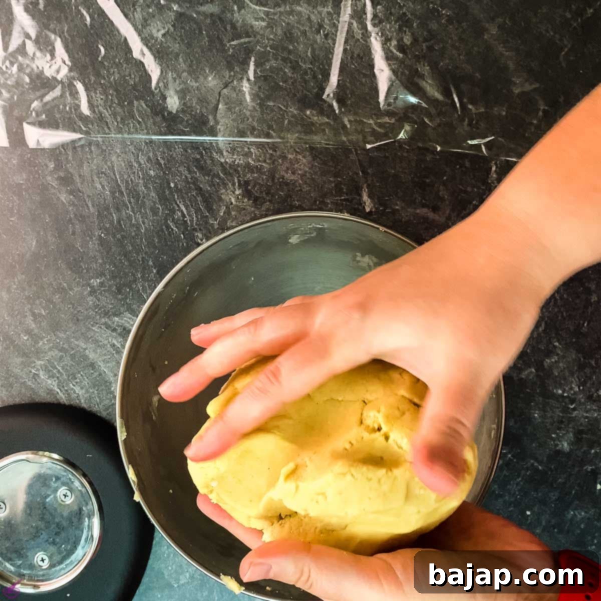 Shape the cookie dough into a ball.