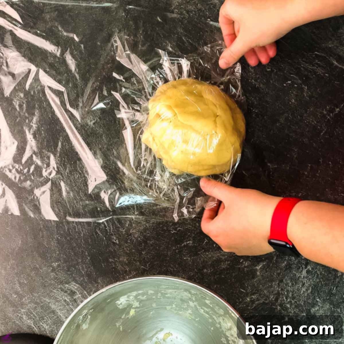 Wrap the cookie dough in cling film.
