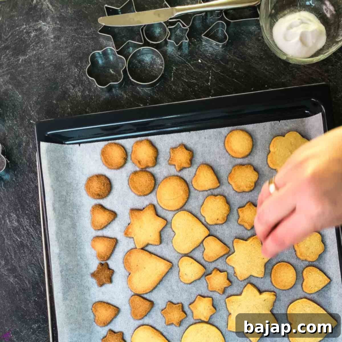 Sprinkle the hot cookies after baking with the cinnamon sugar mix.
