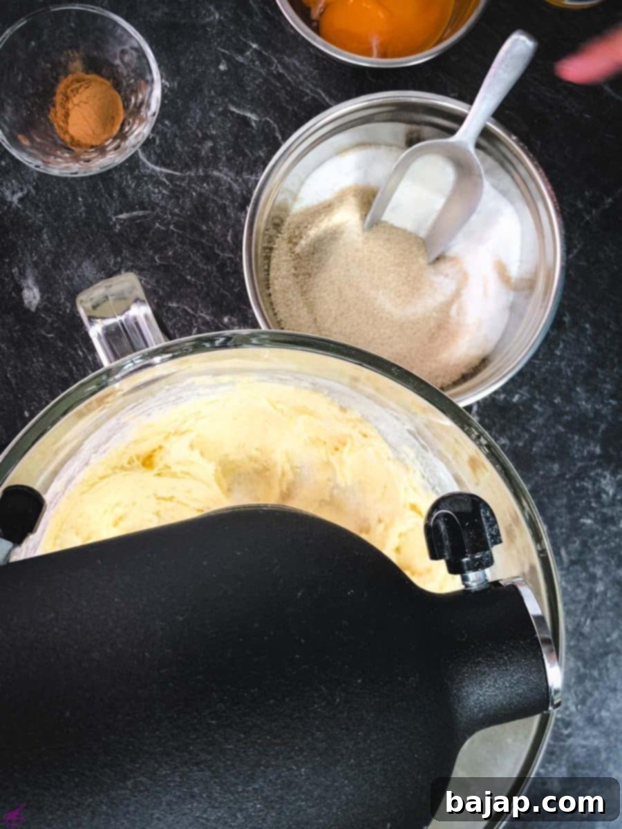 Taste Autumn's Warmth: Unbelievably Soft Pumpkin Cookies 5 Add brown and white granulated sugar to the beaten butter.