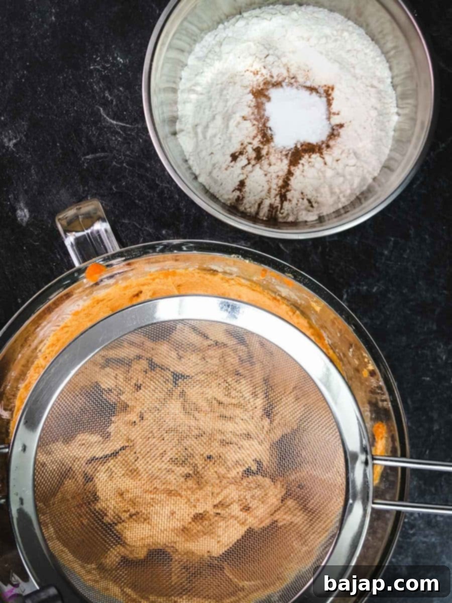 Taste Autumn's Warmth: Unbelievably Soft Pumpkin Cookies 8 Combine all the dry ingredients in a separate bowl.