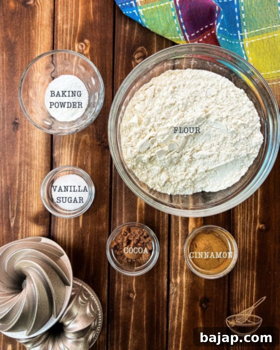 You'll need five simple ingredients to make a homemade cake mix: flour, baking powder, cocoa powder, cinnamon, and vanilla sugar.