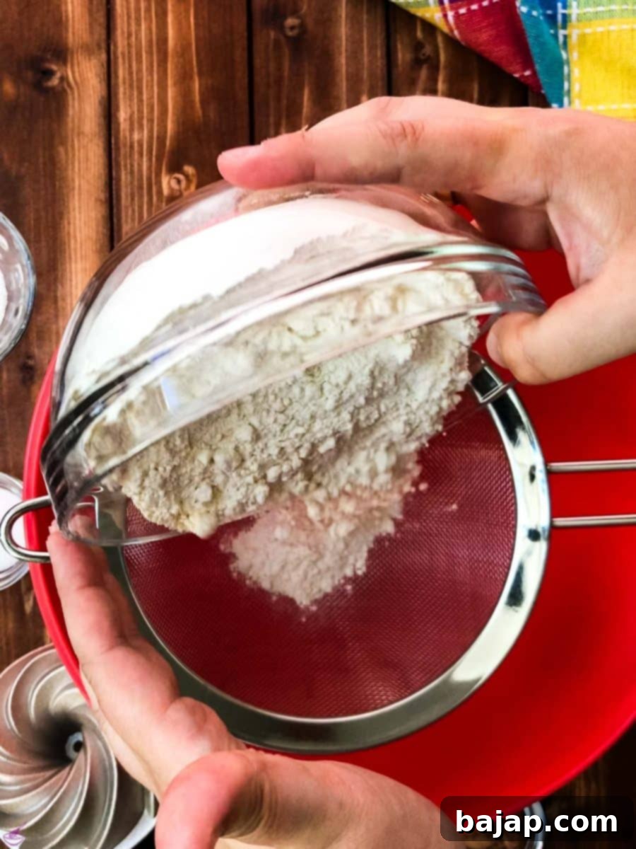 Pour the flour into a close meshed sieve.
