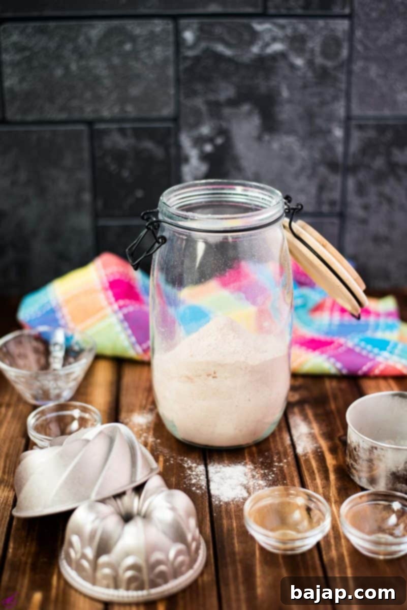 Mason jar, filled with homemade cake mix, ready to be stored.