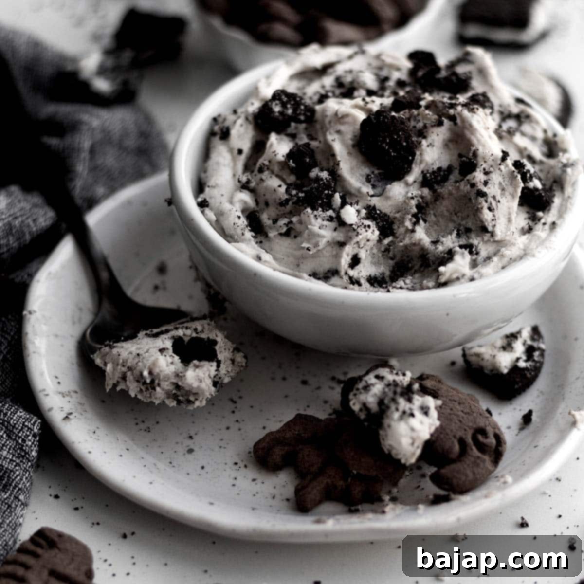 Delicious Oreo Dip, also known as Cookies and Cream Dip, served in a bowl.