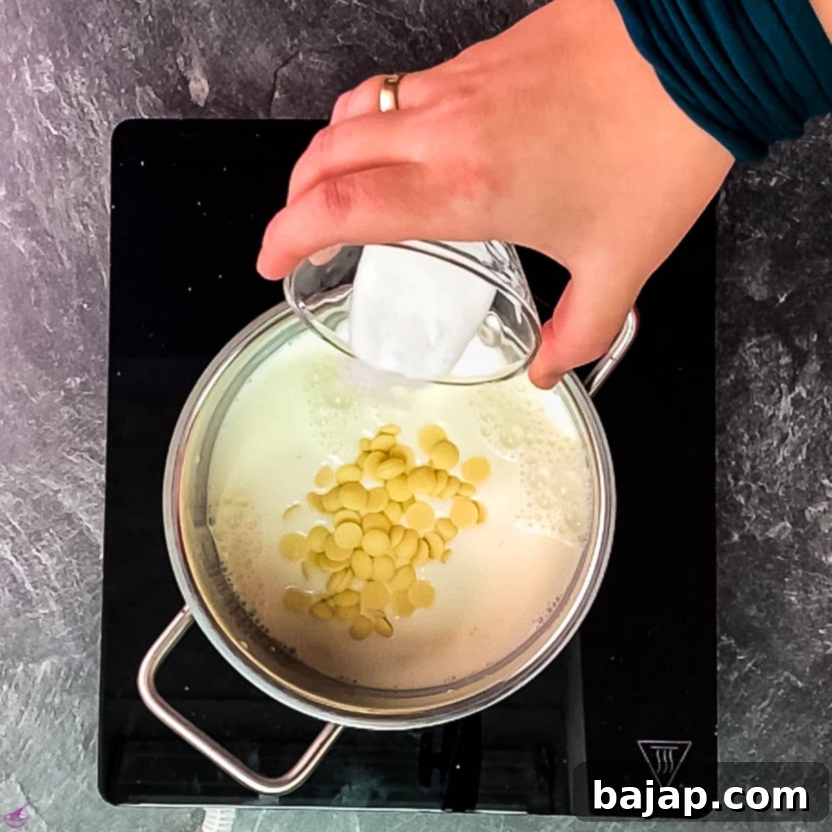 Add the sugar to the chocolate chips with milk.