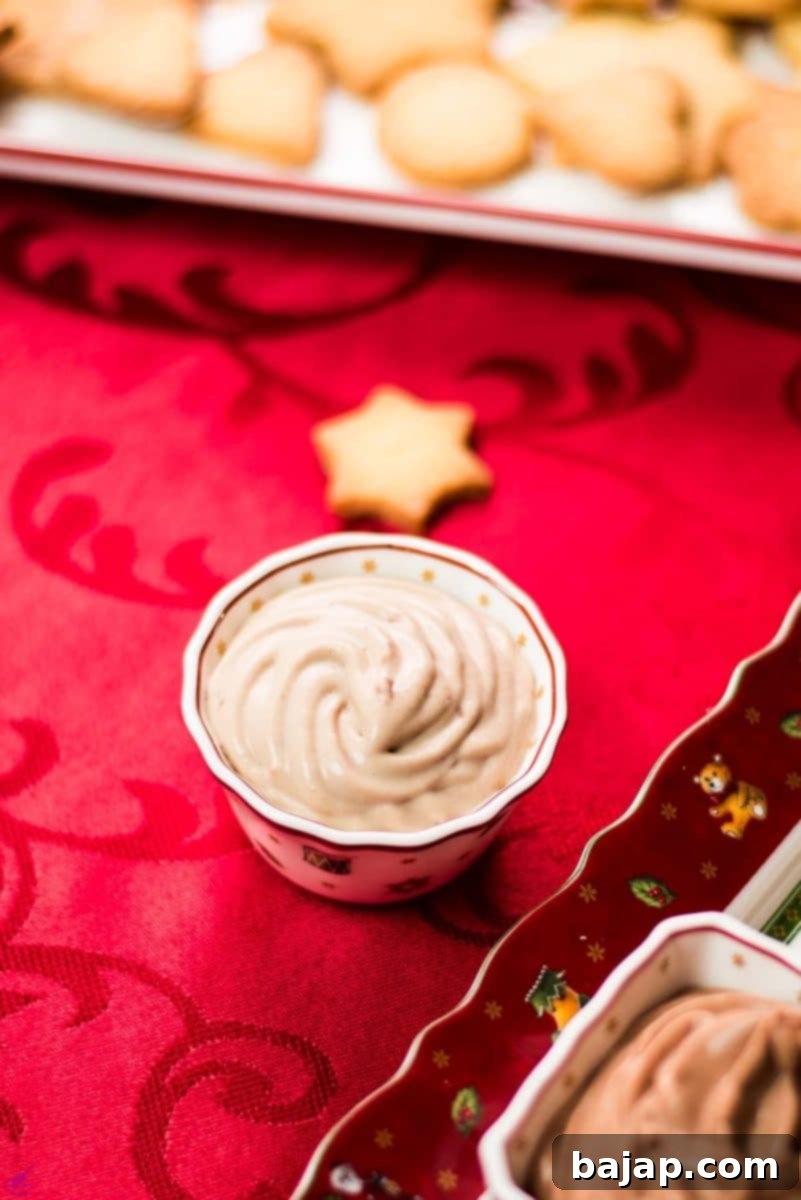 Three beginner-friendly chocolate dips that only require five simple ingredients. Piped in a small gorgeous Christmas dipping bowl.