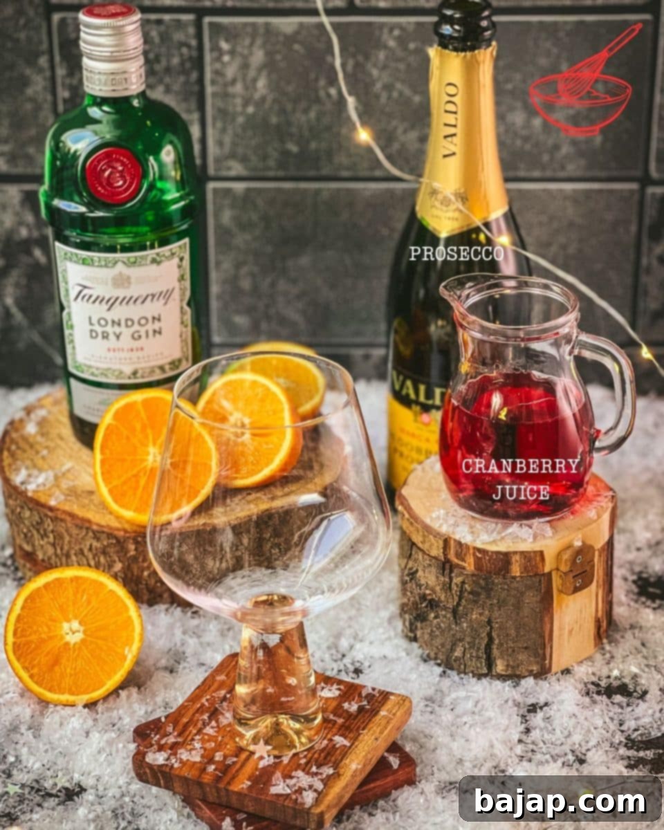 Three ingredients and a handful of cubed ice is required for making a truly festive cranberry gin spritz. Enjoy!