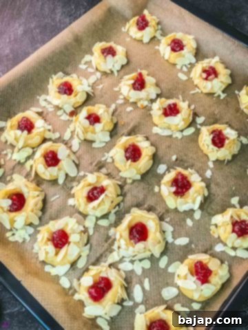 Raspberry thumbprint cookies prior baking.