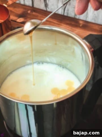 Add the vanilla extract to the milk and the white chocolate chips.