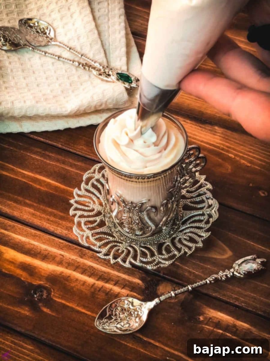 Top the strawberry white hot chocolate with homemade strawberry-flavored whipped cream!