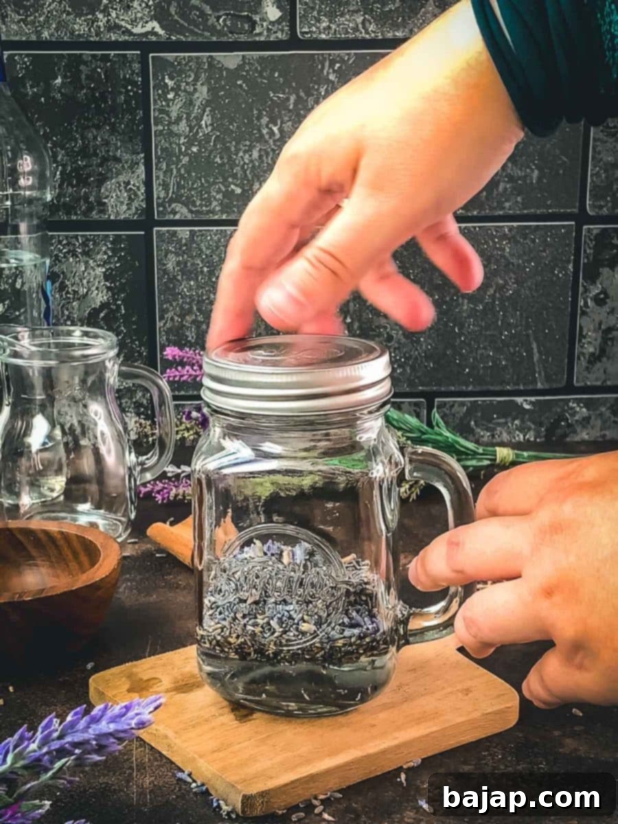Securely close the lid of the mason jar and shake vigorously to begin the lavender infusion process.