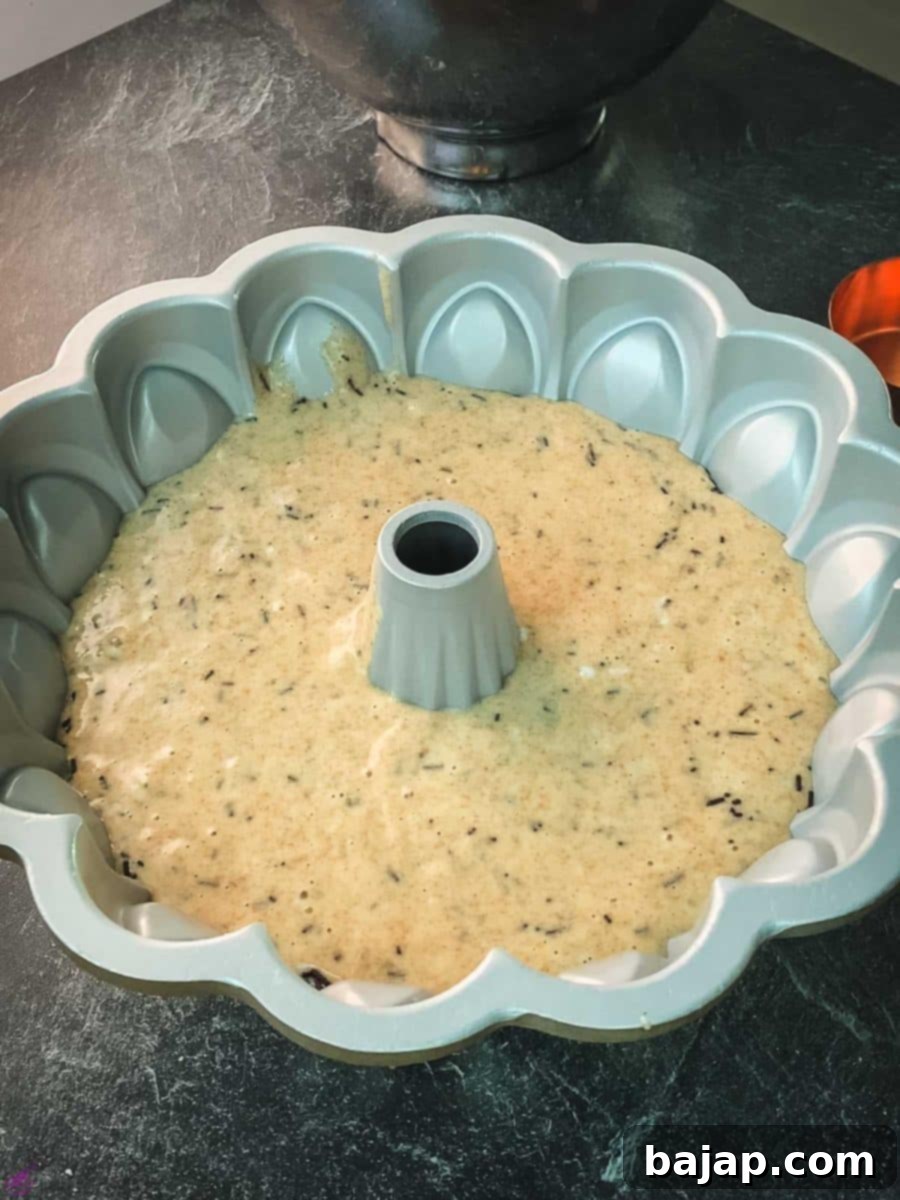 With cake batter filled bundt cake pan.