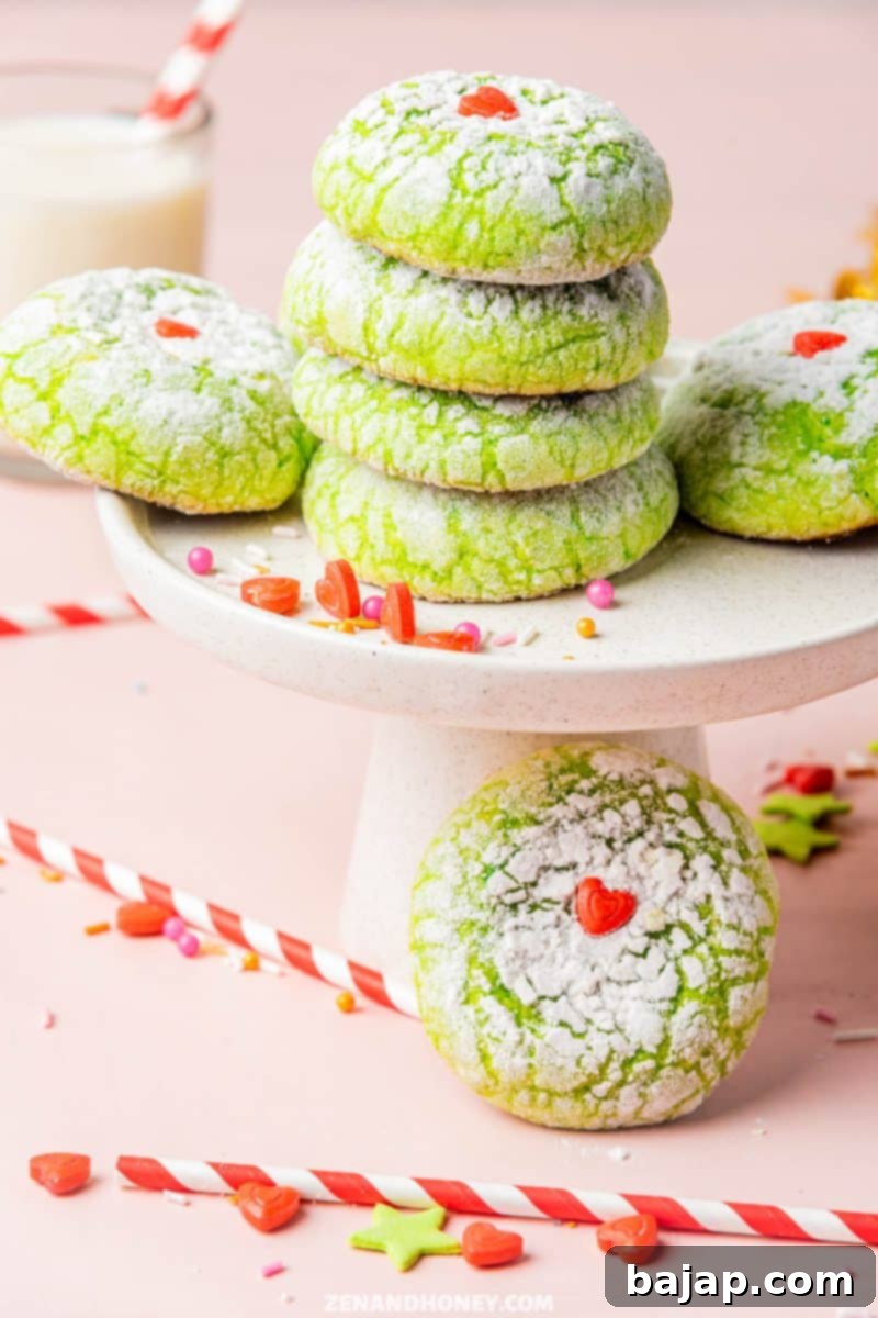 Grinch Crinkle Cookies with green and red colors