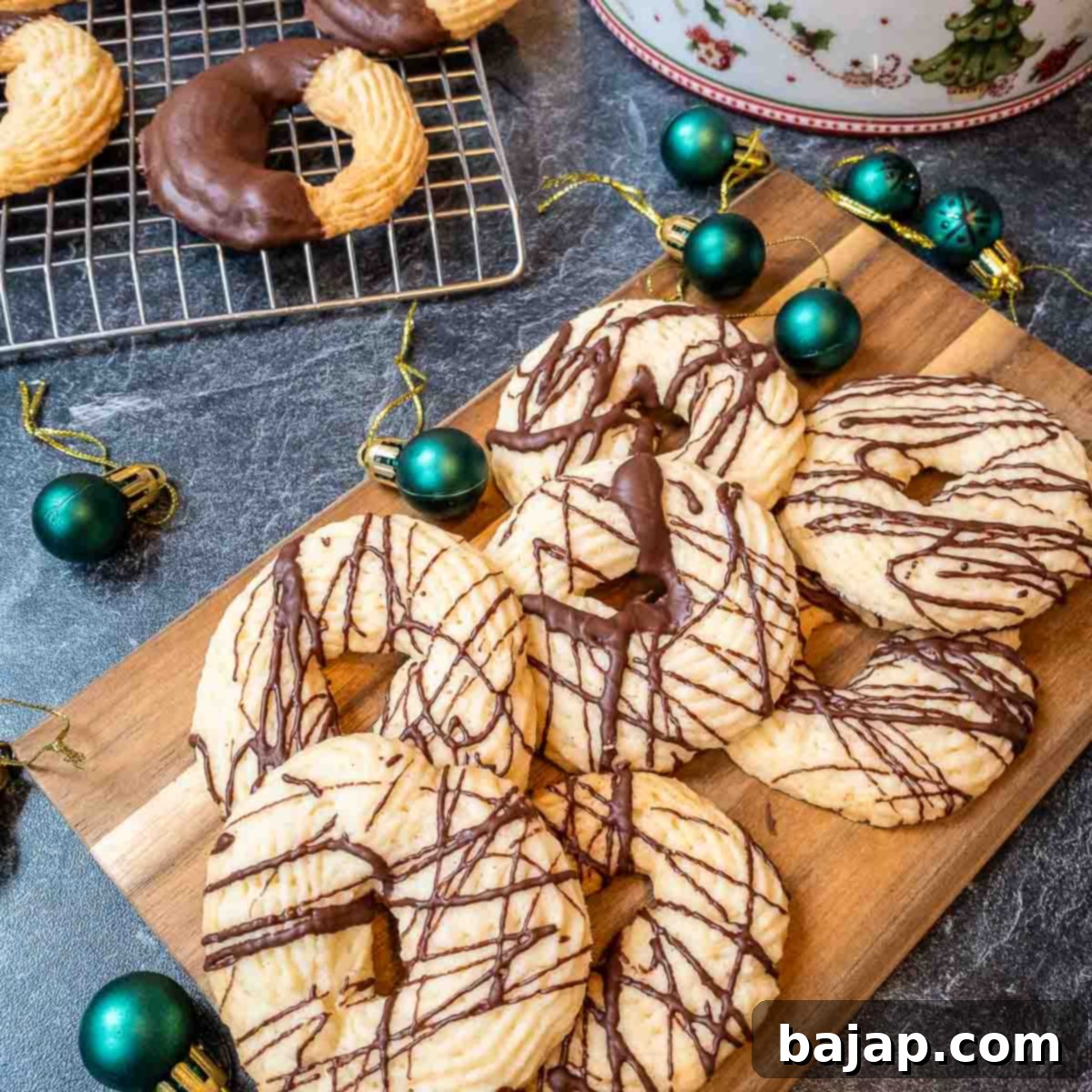Chocolate drizzled and chocolate dipped butter cookies ready to eat.