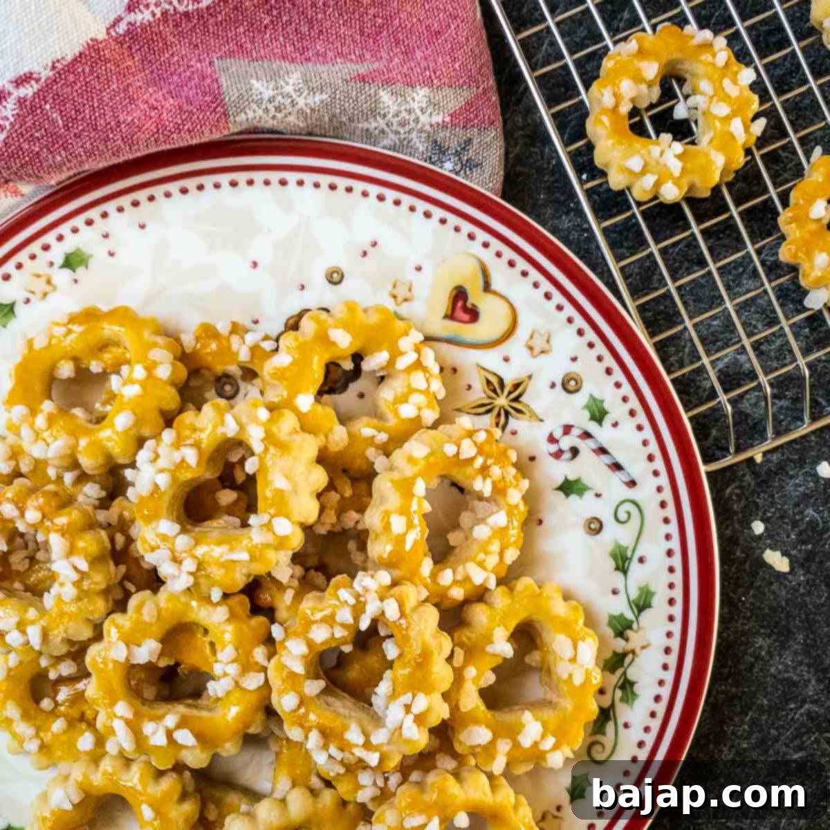 Sour Cream Cookies, spread with egg yolk and sprinkled with nib sugar.