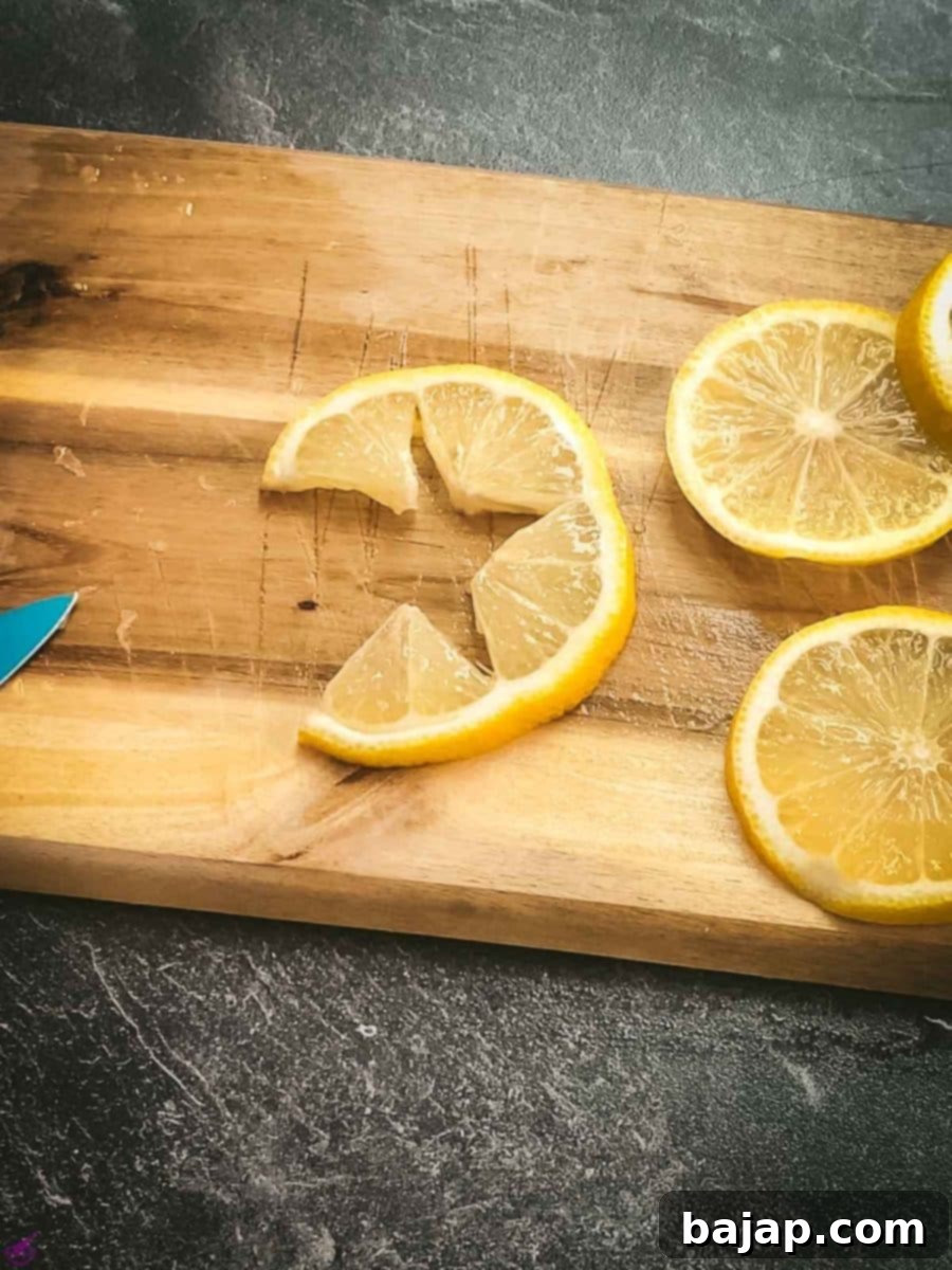 Cut into the lemon without cutting through.