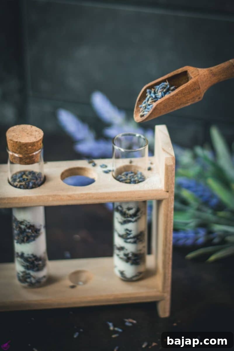Glass vials filled with layers of dried lavender and granulated sugar. The perfect gift for baking enthusiasts and friends.