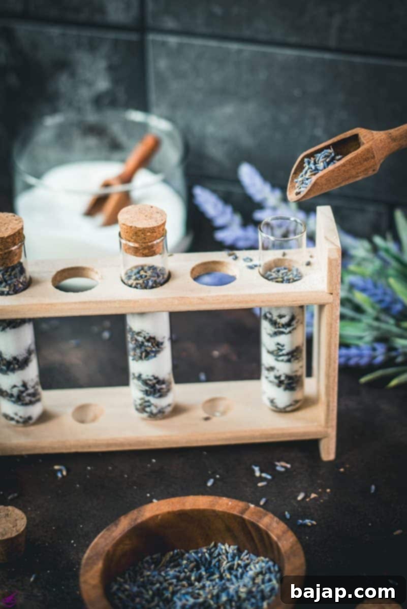 Elegant glass vials filled with layers of dried lavender and crystal sugar, beautifully packaged and ready to be given as thoughtful homemade gifts.