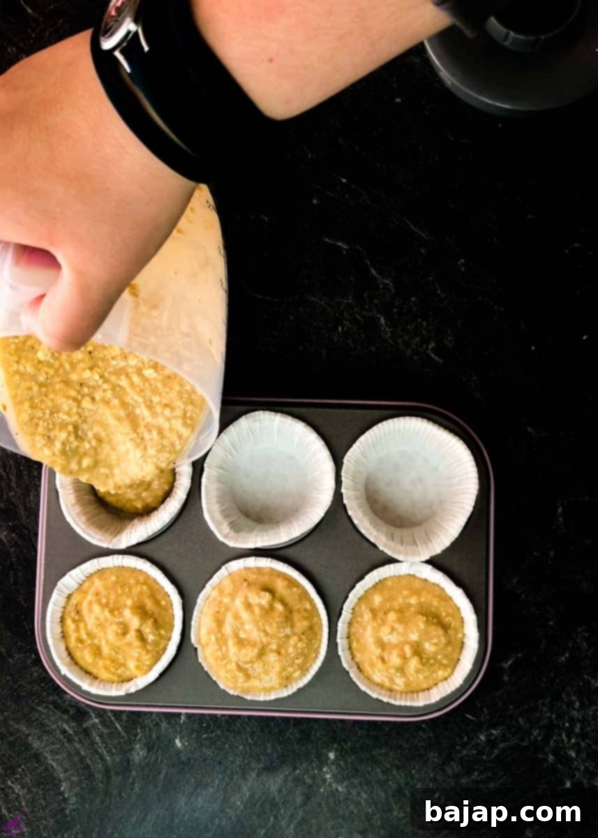 Pour the batter into muffin molds.