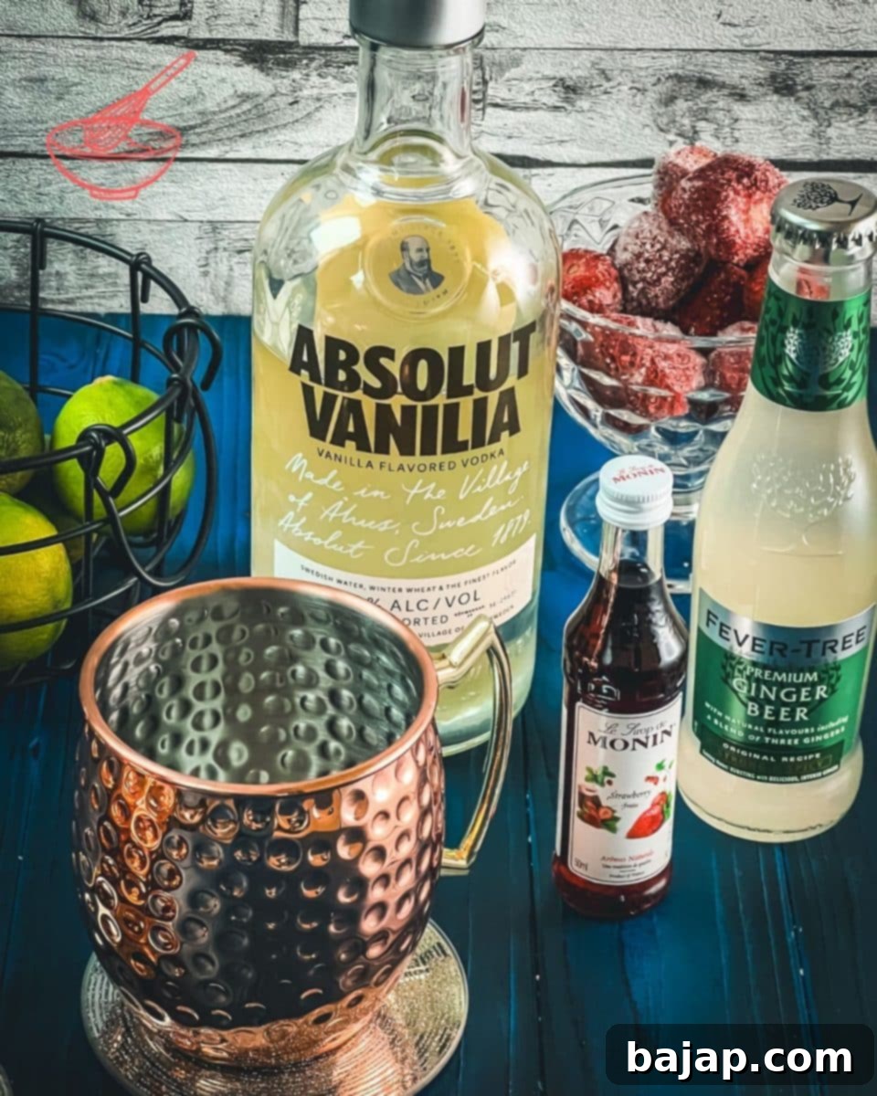The Ultimate Strawberry Moscow Mule 3 Ingredients for making a delicious strawberry Moscow mule - lime juice, ginger beer, vanilla vodka, strawberry syrup.