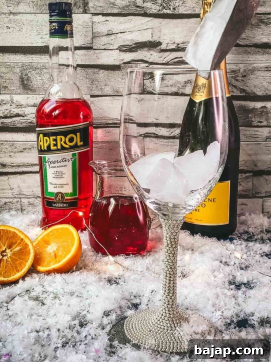 Add cubed ice to the glass.