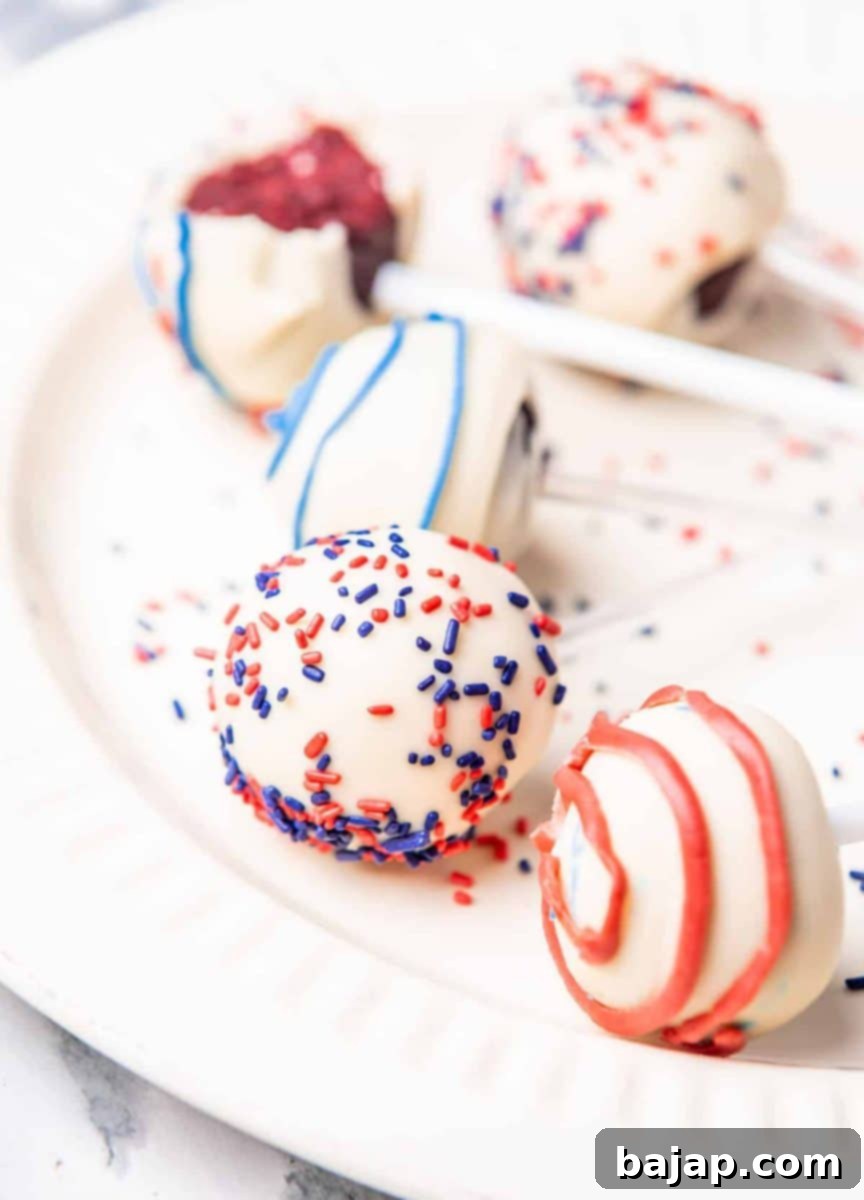 Cupid's Kitchen Valentine's Day Treats 13 Festive red velvet cake pops, coated in white chocolate and adorned with sprinkles.