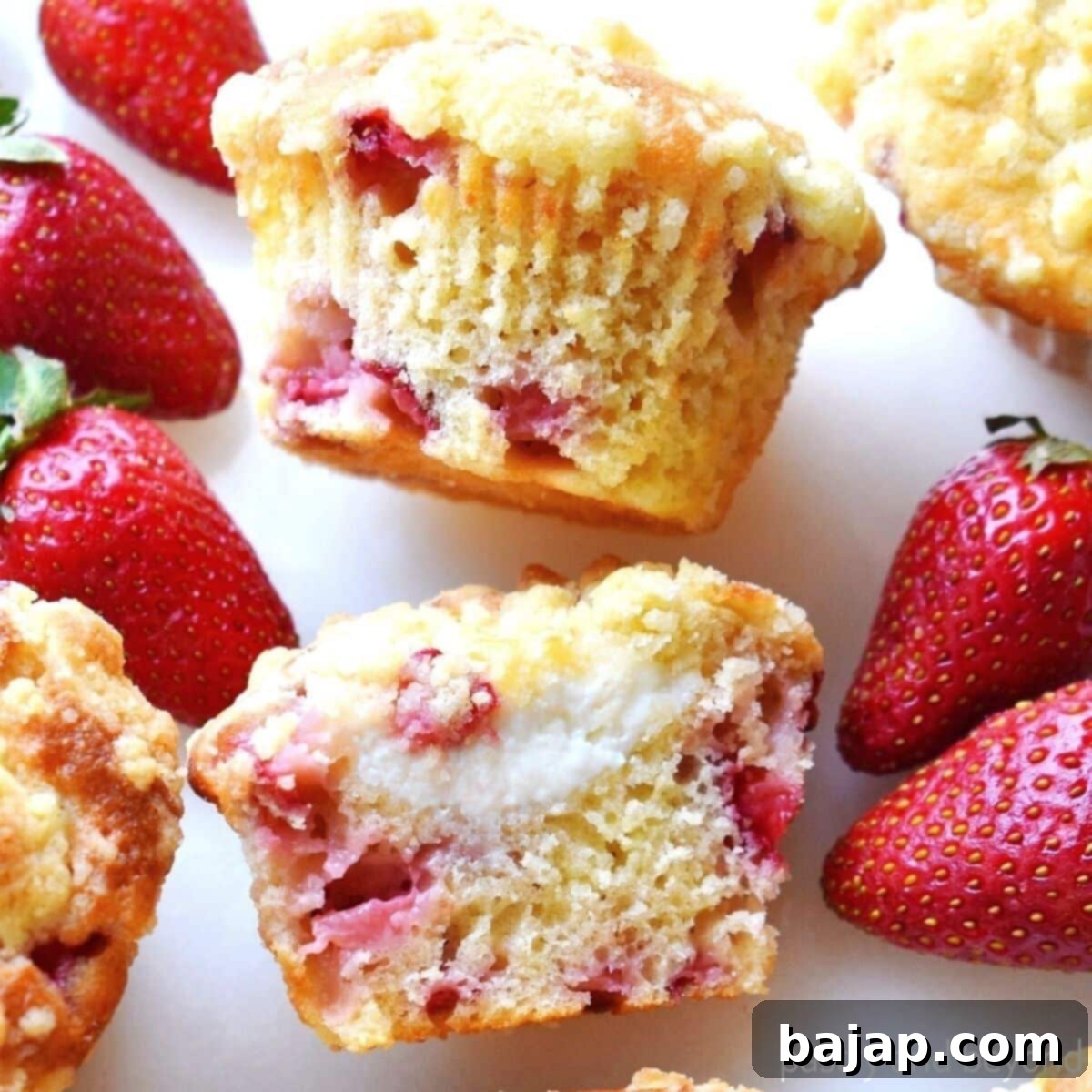 Cupid's Kitchen Valentine's Day Treats 20 Delicious strawberry cream cheese muffins with a streusel topping, baked to perfection.