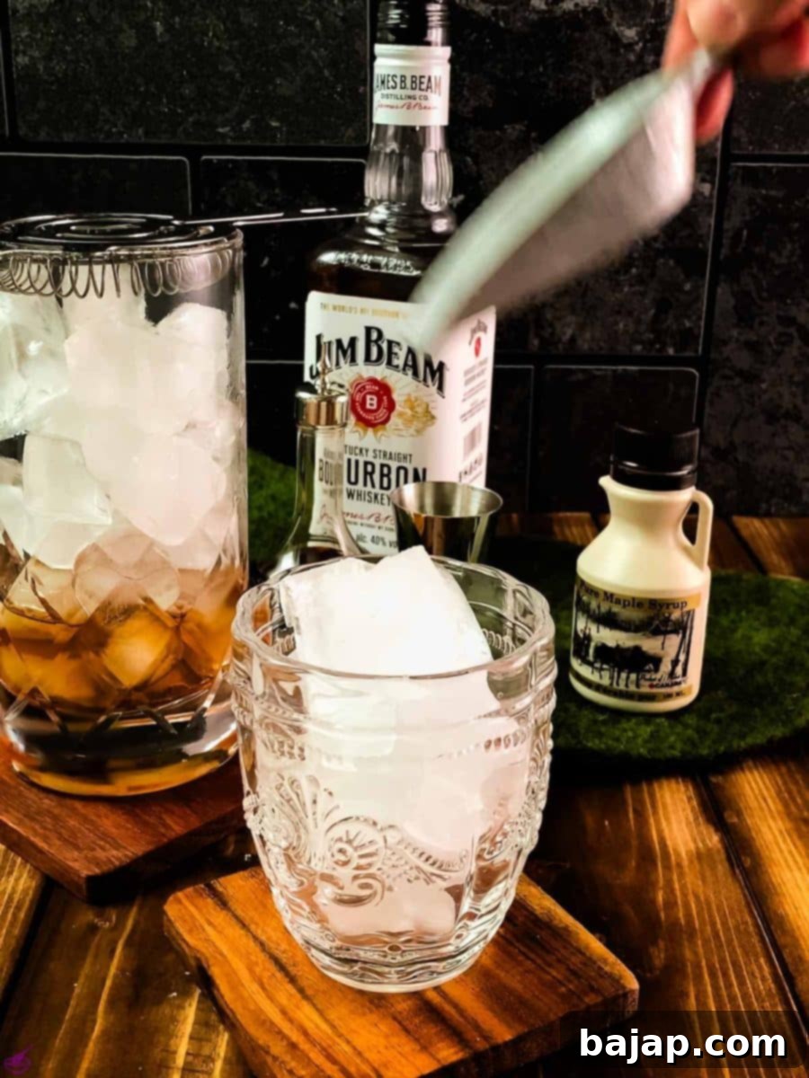 Golden Maple Old Fashioned 8 Add cubed ice to your serving glass.