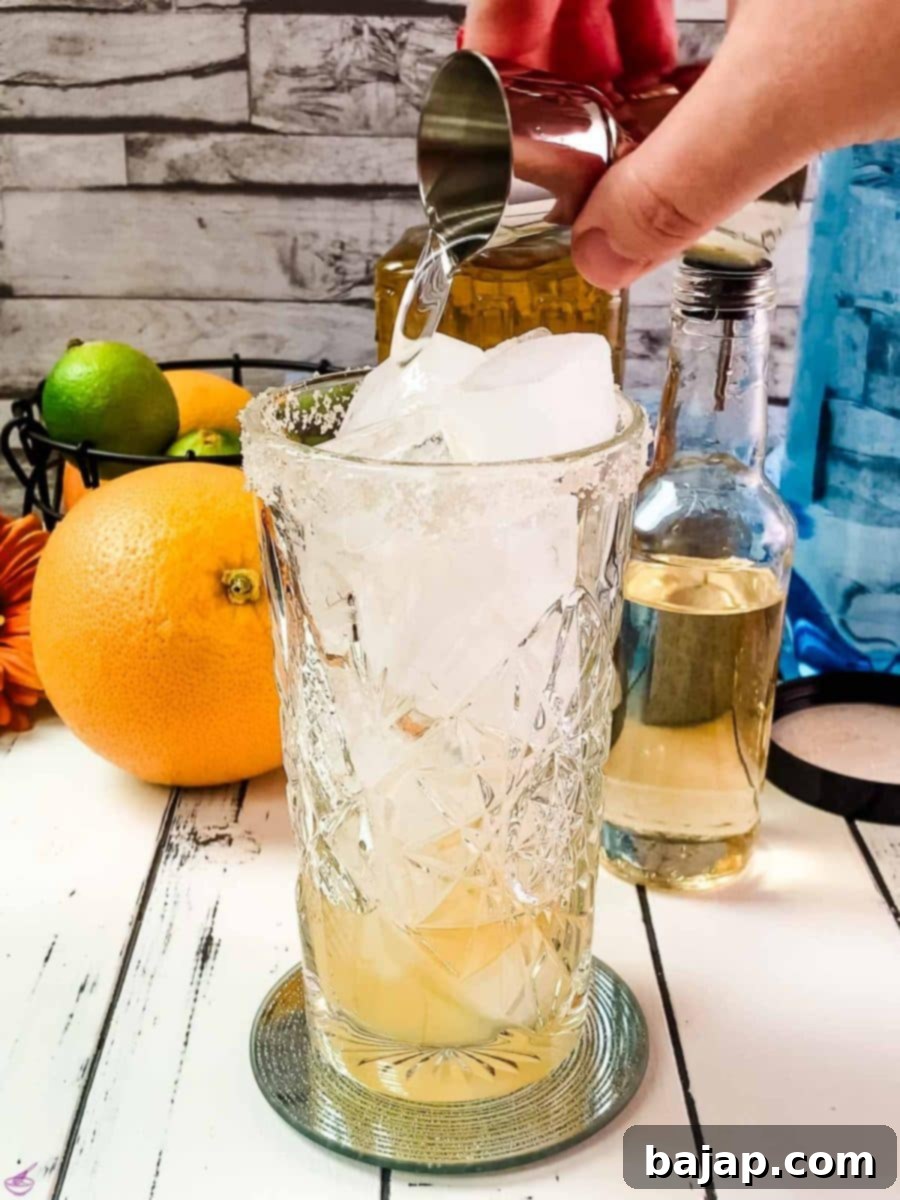 Pour the tequila into the glass, making it the star of this classic Mexican cocktail.