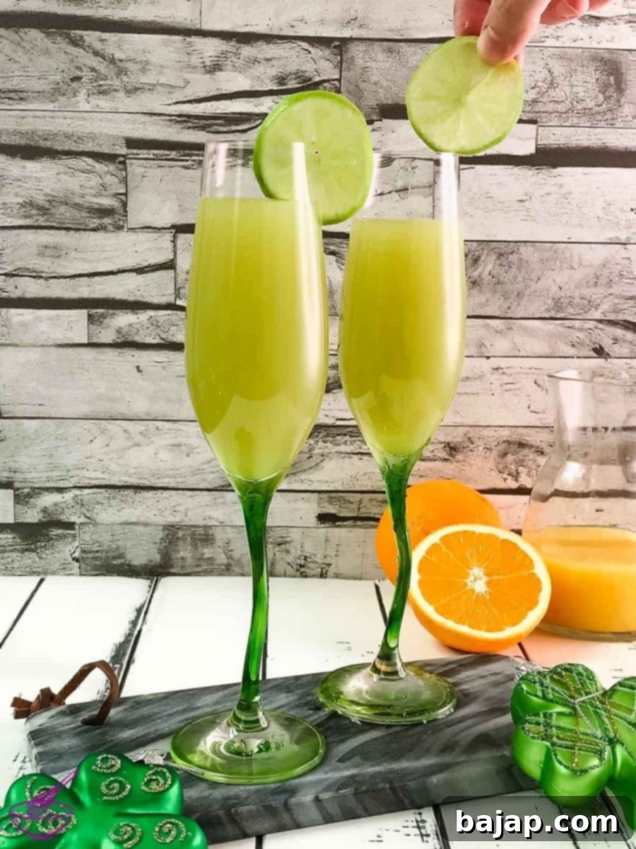 Garnish your festive green mimosa with a fresh lime or orange wedge for an extra touch.