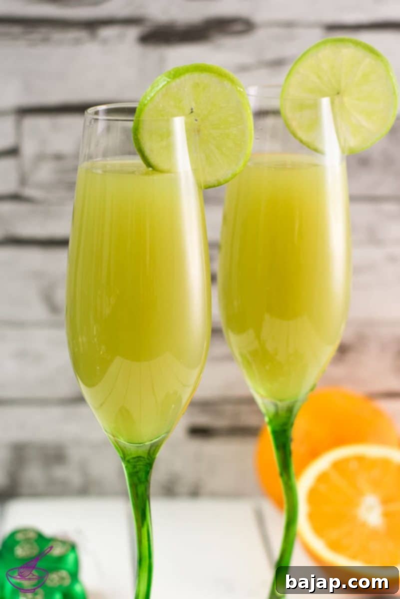 A stunning and festive St. Patrick's Day Mimosa in a soft, natural green, made without artificial food coloring using just three simple ingredients!