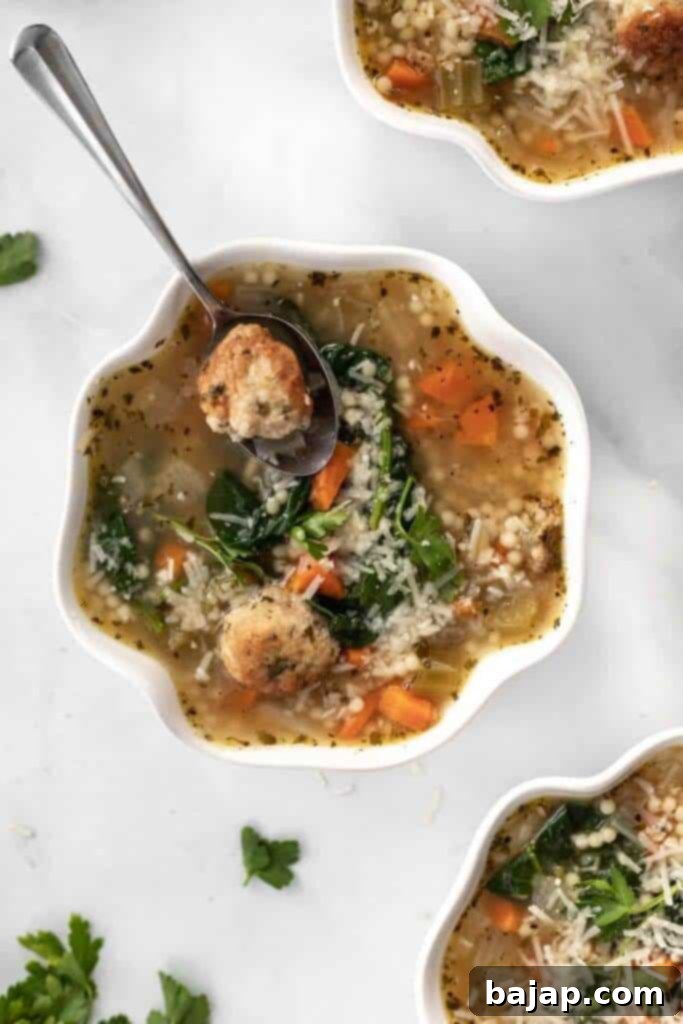Instant pot Italian wedding soup is the perfect bowl of comfort! It's jam-packed with little pearls of pasta, a whole bunch of spinach, flavorful Italian herbs and seasonings, and hearty meatballs.