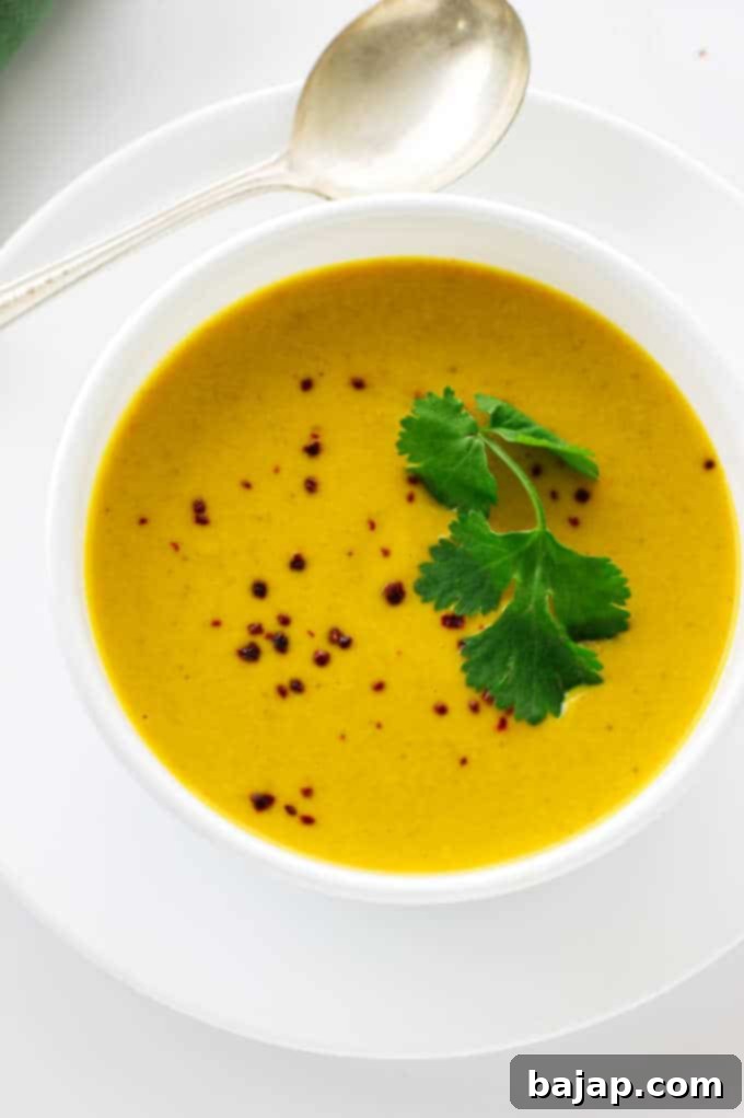 This Thai pumpkin soup is a rich, creamy soup with a touch of spice from the Thai Chili Paste. This soup has a nice spiciness to it which is well balanced with a creamy coconut deliciousness.