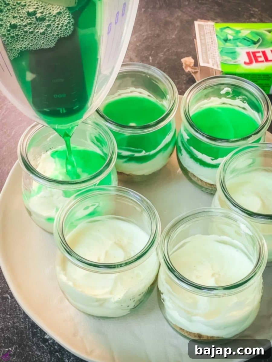 Pour the lime Jell-o on top of each cream cheese filled jar.