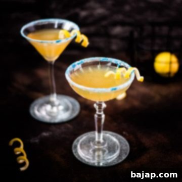 Lemon-Kissed Whiskey Sidecar 16 Whiskey sidecar with gorgeous lemon twist and white blue sugar rim.