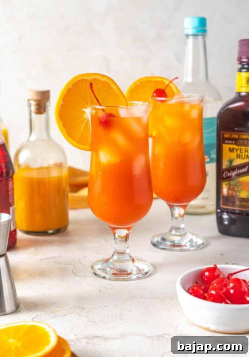 Hurricane Cocktail, a sweet New Orleans staple drink with rum, grenadine, and other tropical flavors.