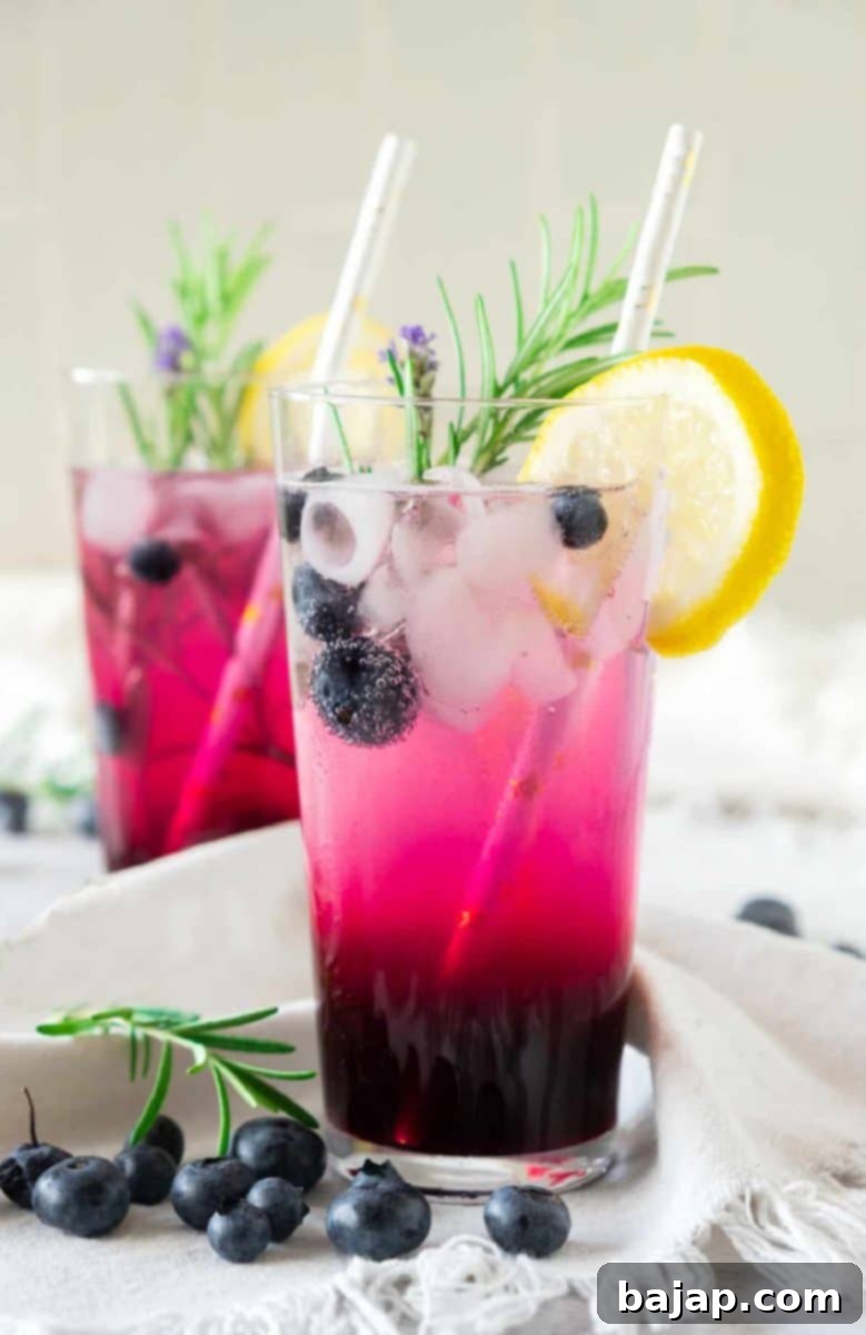 Blueberry Vodka Lemonade, a refreshing drink that's a bit sweet, tangy, and boozy, with make-ahead blueberry syrup.