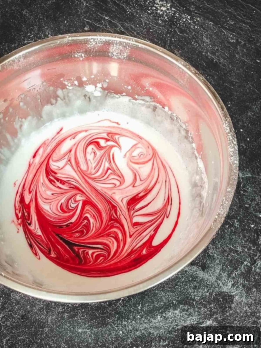 Use a toothpick to marble the color into the icing.