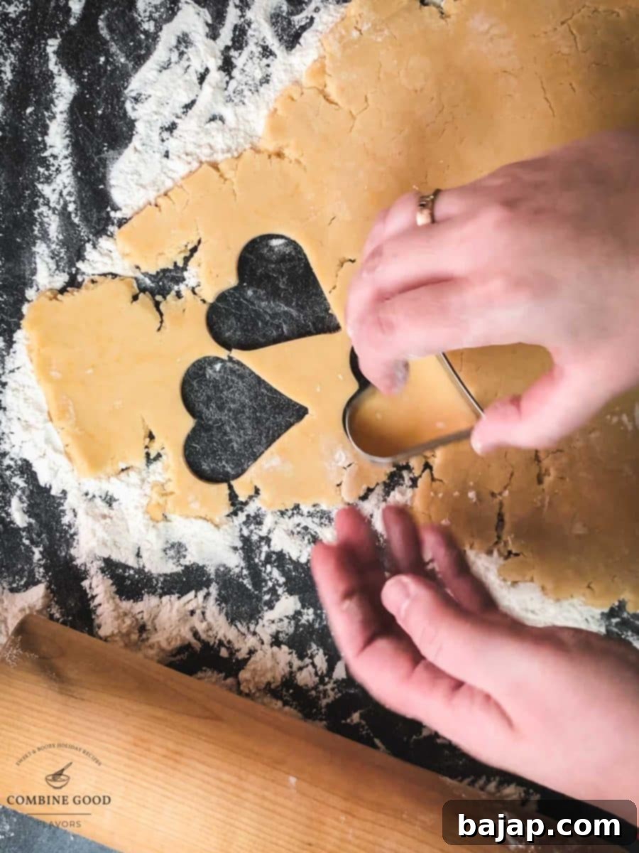 Cut out the heart shaped cookies using different cookie cutter sizes.